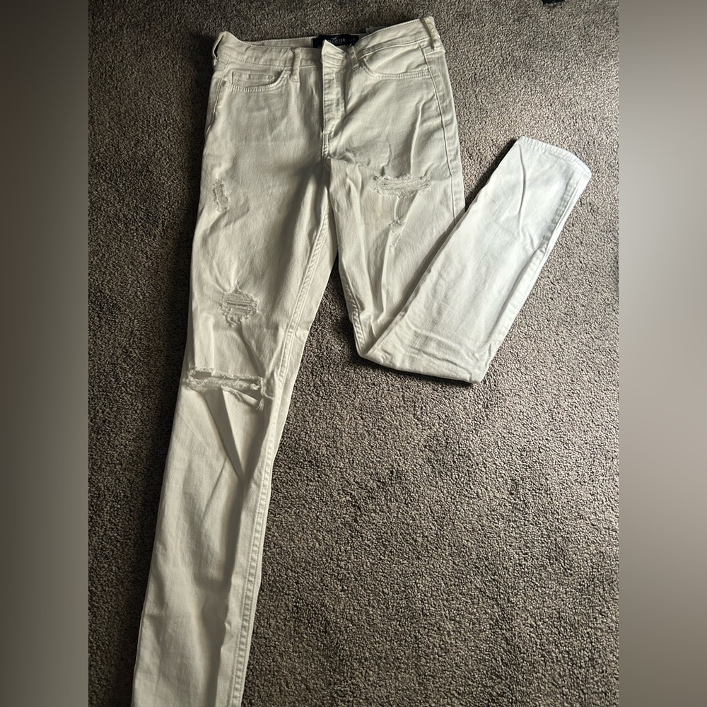 White, ripped Hollister stretchy skinny jeans.